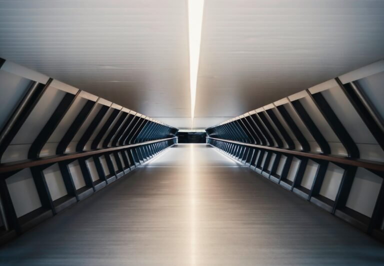 A sleek and futuristic underground tunnel in London, showcasing modern architectural design.